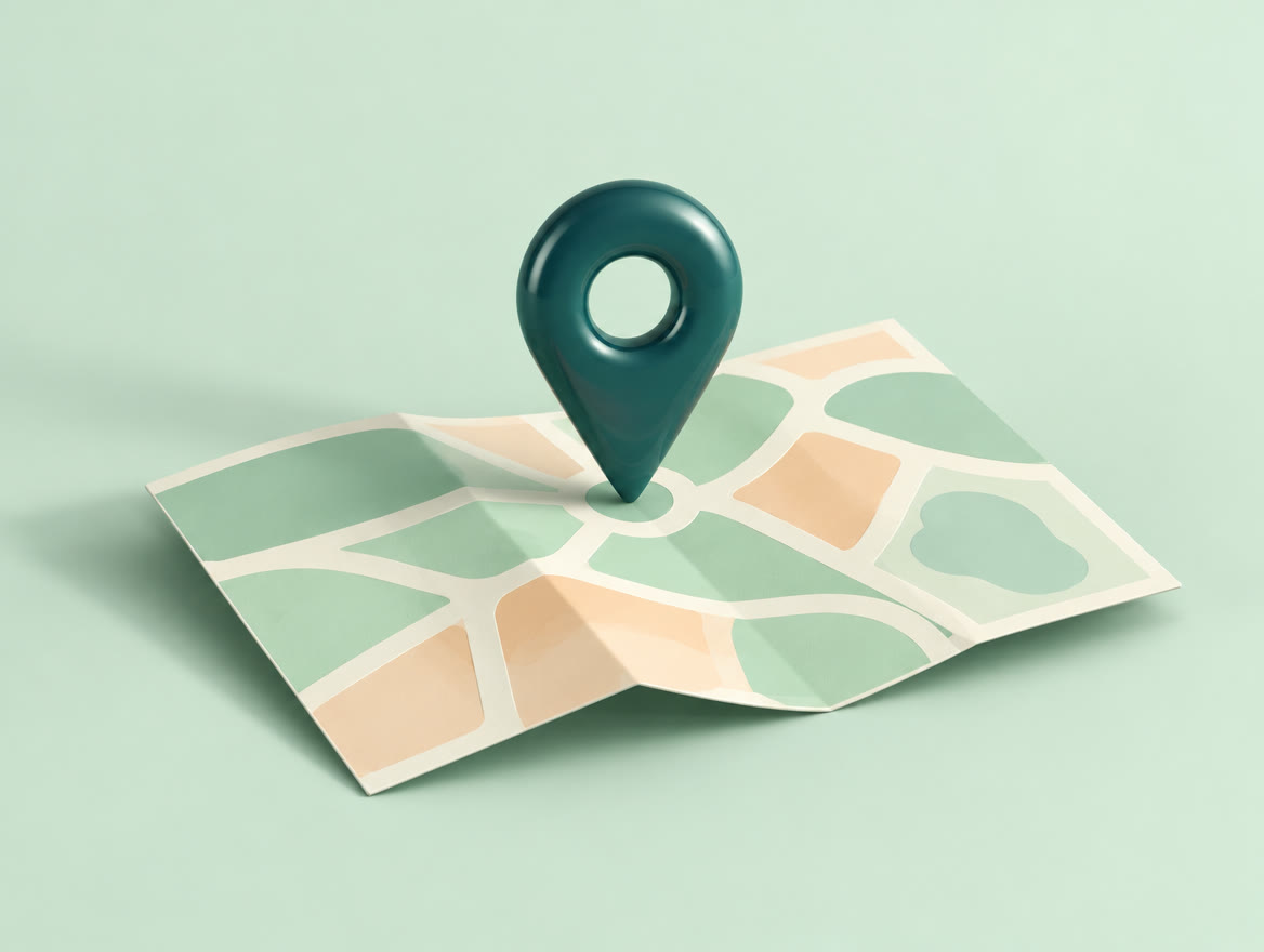 A teal 3D map pin standing on an abstract folded paper map on a mint background